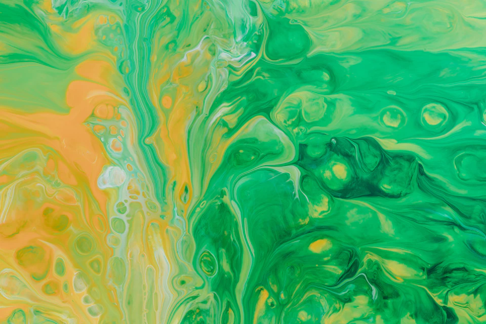 Vibrant abstract painting dominated by shades of green and yellow with loose brushstrokes