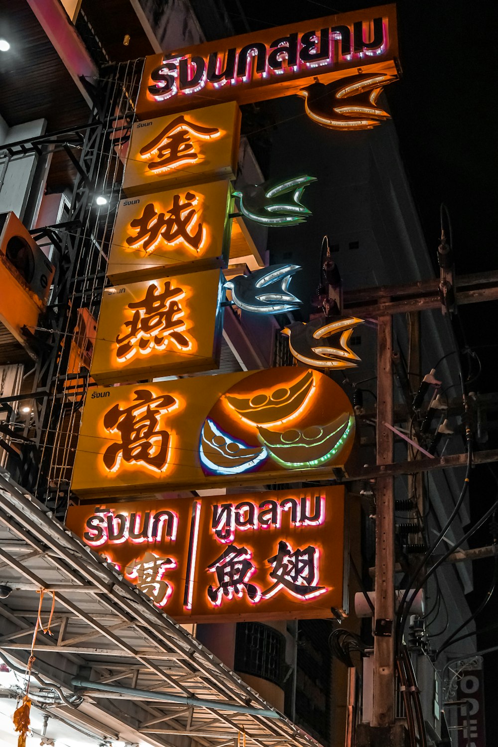 brown and red lighted neon signs