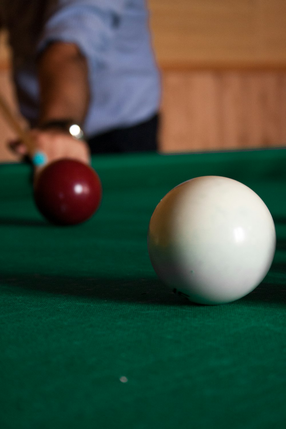 person playing billiard