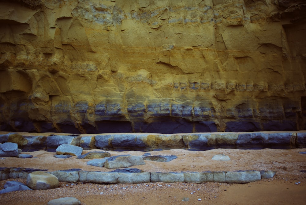 gray rocks near brown mountain during daytime