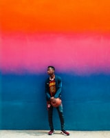 Teenagers wearing colorful sportswear ready for basketball practice