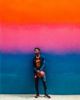 Teenagers wearing colorful sportswear ready for basketball practice