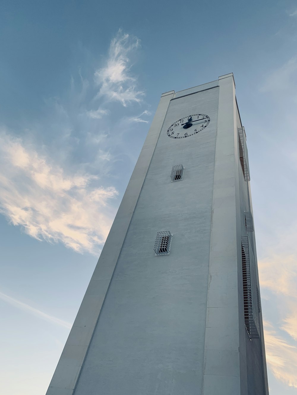 architectural photography of building with clock