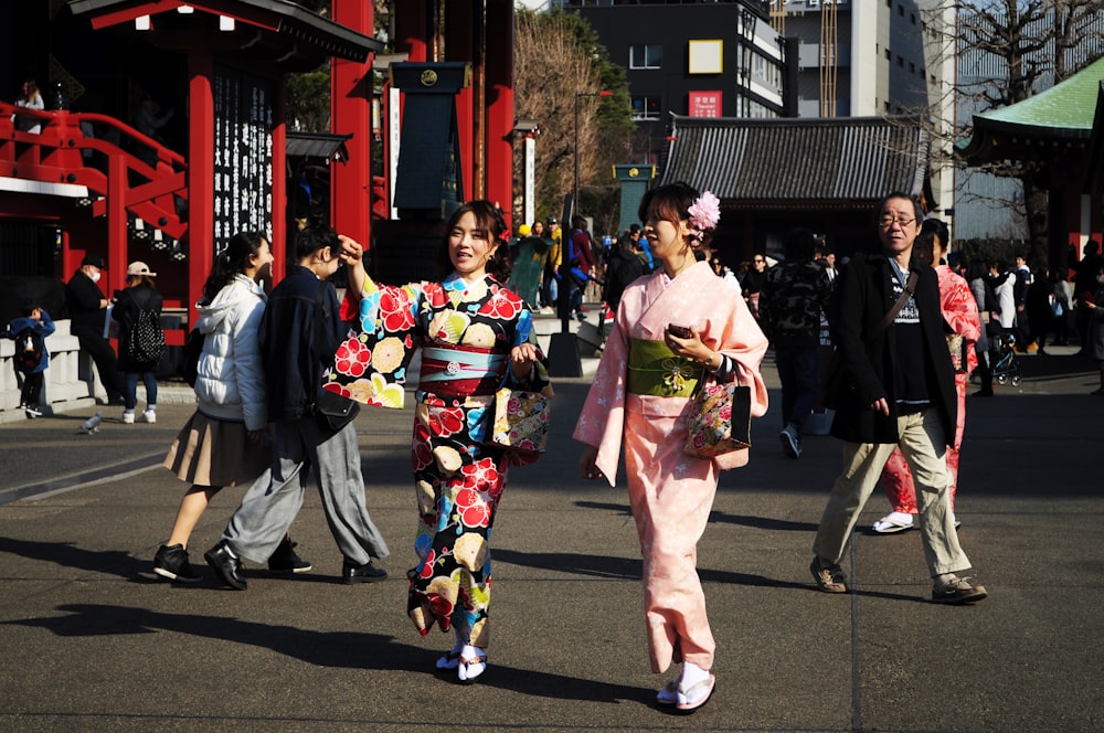 two women dancing during daytime