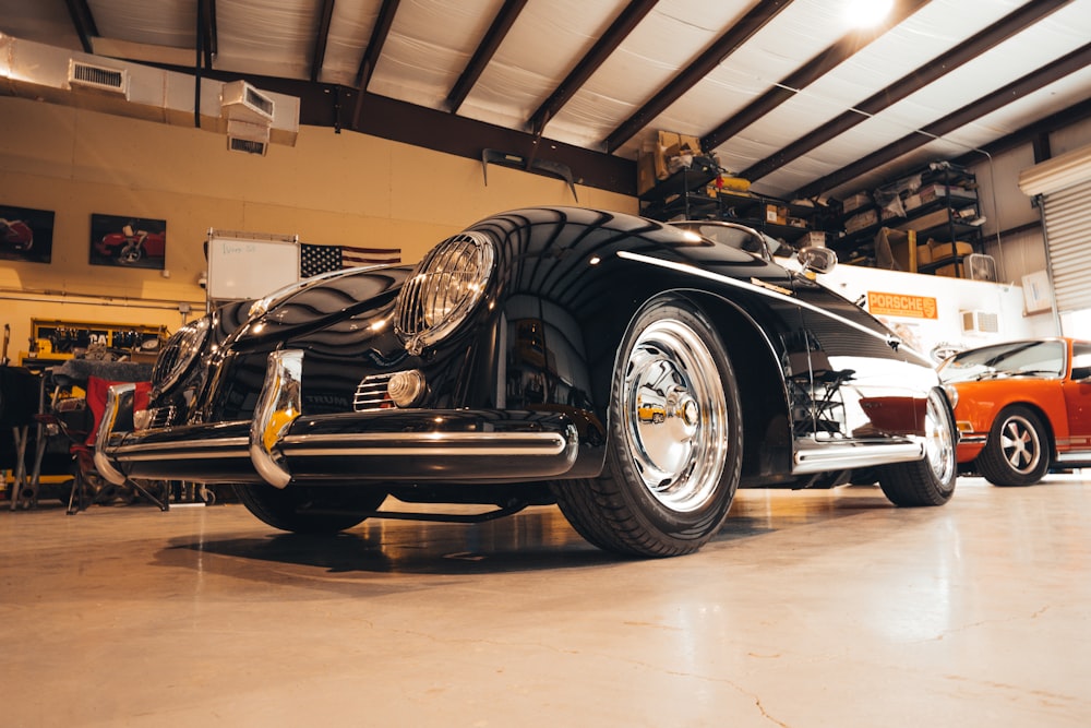 black convertible coupe parked inside room