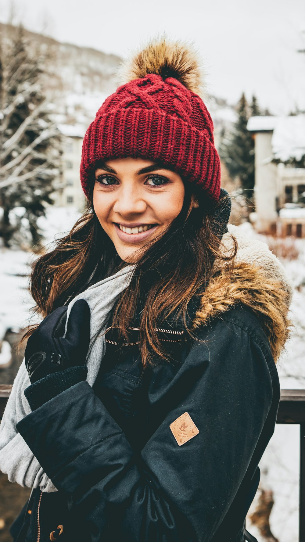 woman standing beside railings