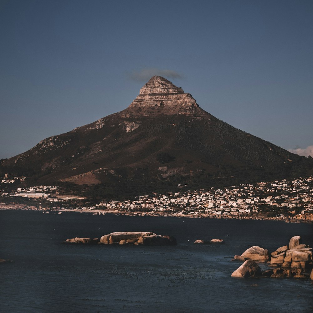 mountain near body of water