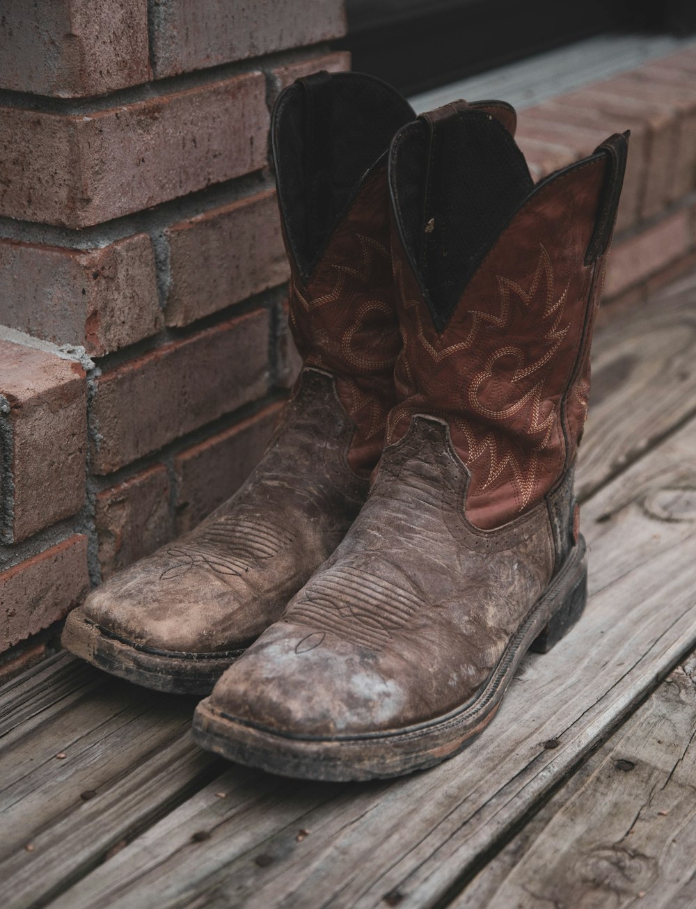 pair of brown cowboy boots
