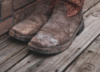 pair of brown cowboy boots