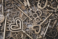 Rustic metal keys hanging on a distressed wooden board, hinting at stories from the past.