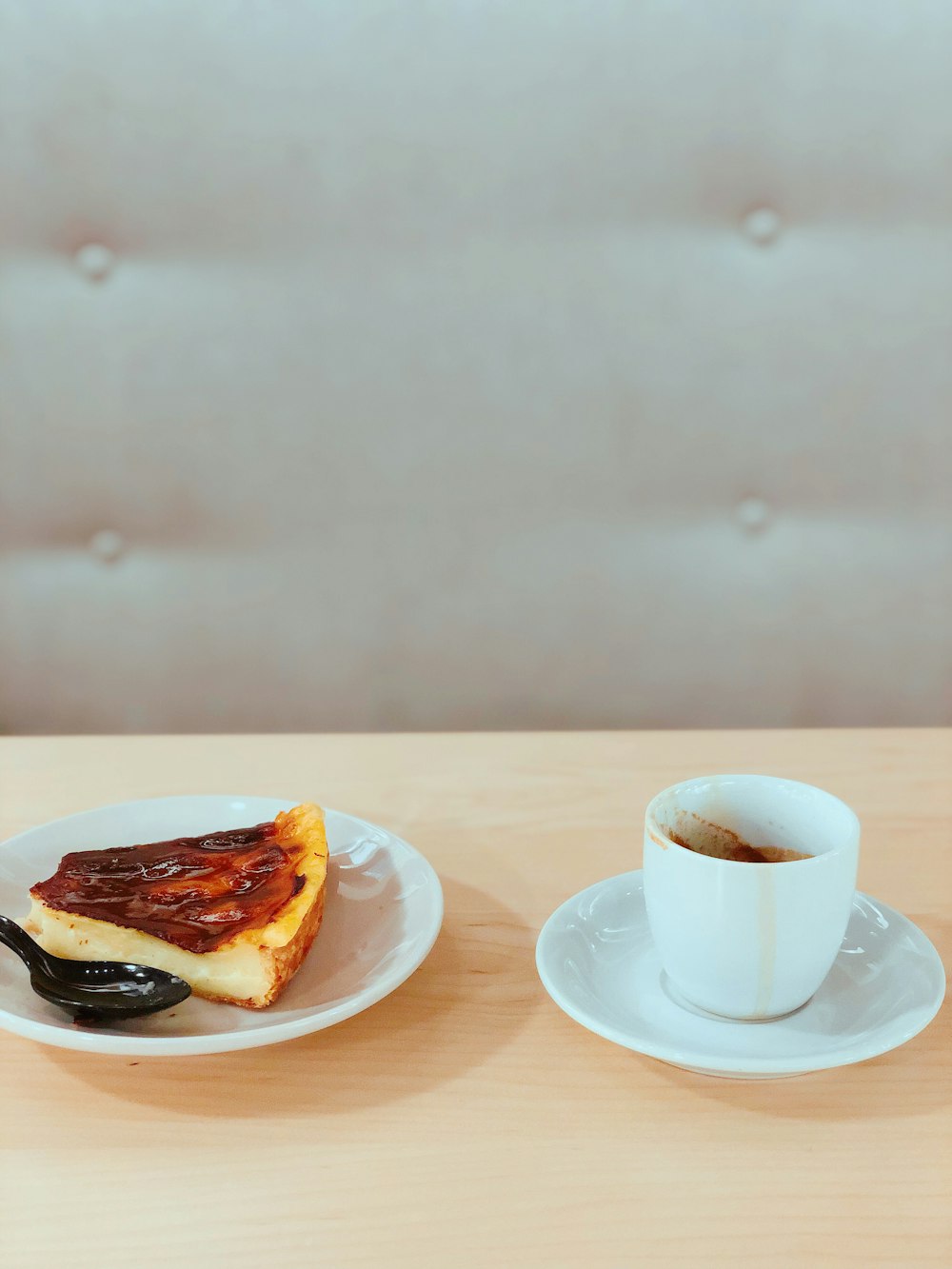 white ceramic teacup and saucer