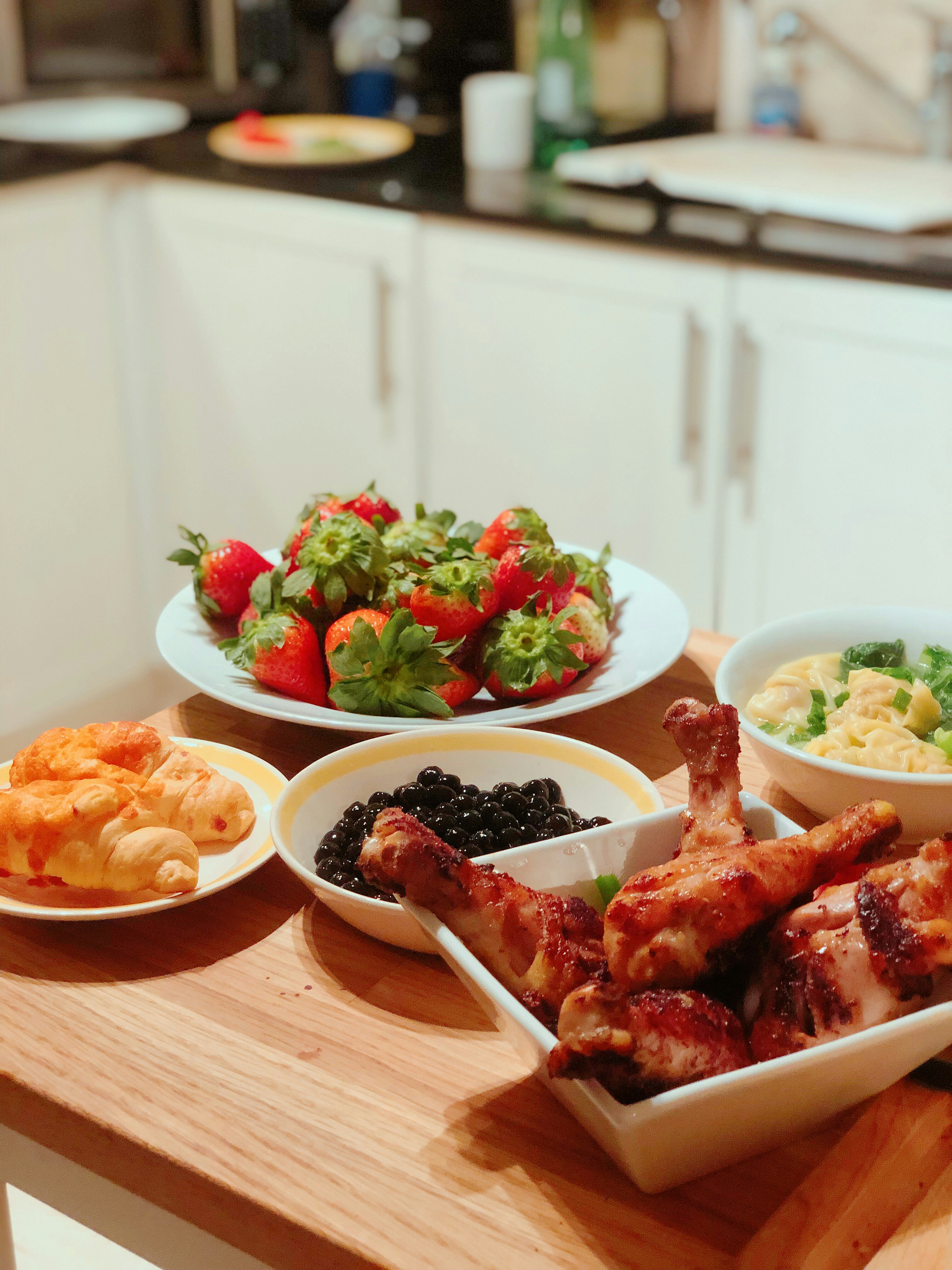 An inviting wooden table set with homemade dishes prepared using kitchen gadgets.