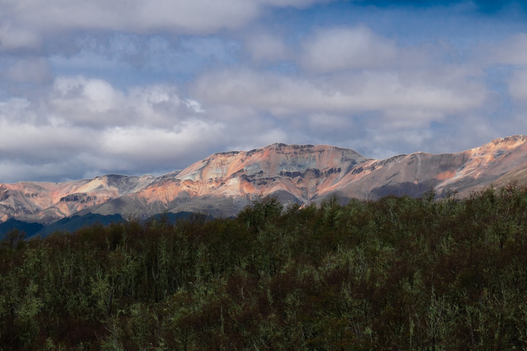 snow capped mountain under cloudy sky during daytime