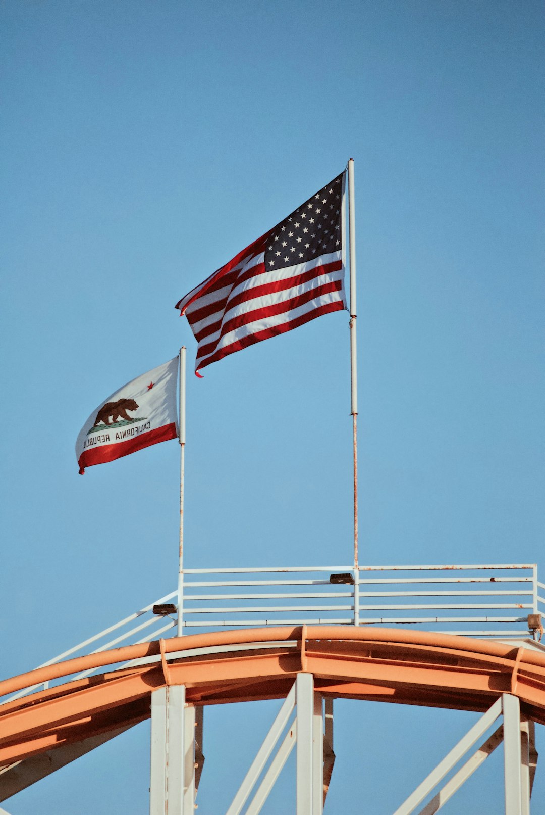 US flag and California flag on poles