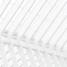 a close up of a white wall with lines on it