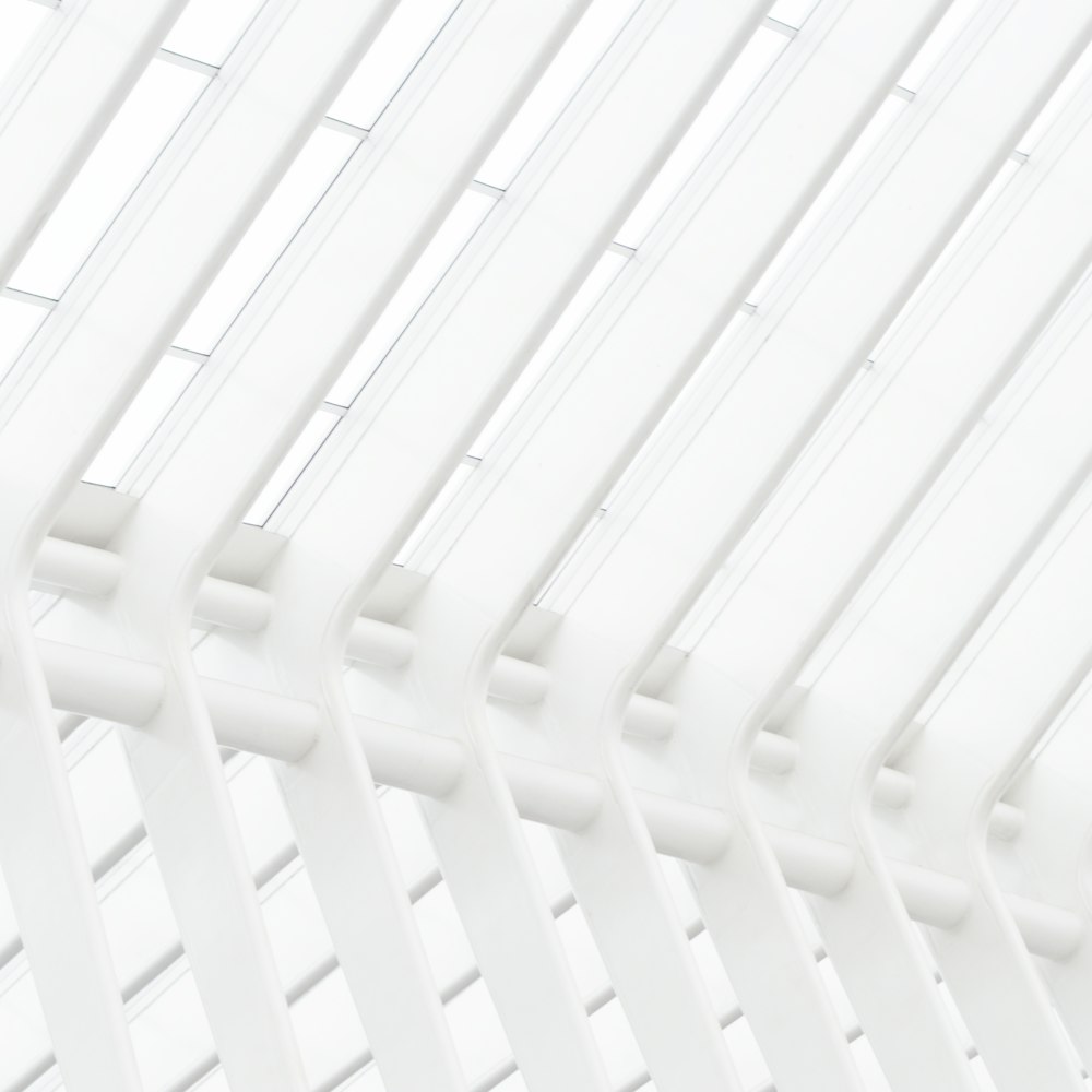a close up of a white wall with lines on it