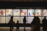 Artwork displayed in a gallery illustrating tokenized art pieces.