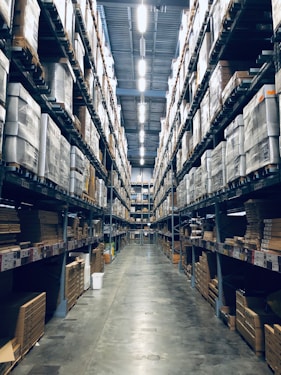 Forklift moving pallet stock in a distribution centre