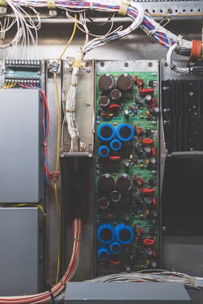Detailed drafting board showing electrical circuit diagrams and schematics.