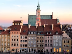people walking near multicolored building