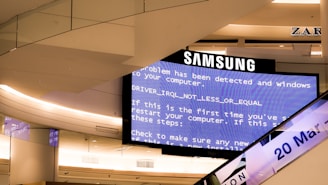 black Samsung flat screen monitor turned-on displaying boot sequence error