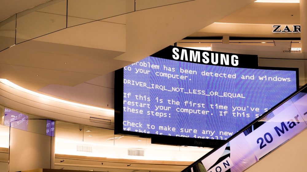 black Samsung flat screen monitor turned-on displaying boot sequence error
