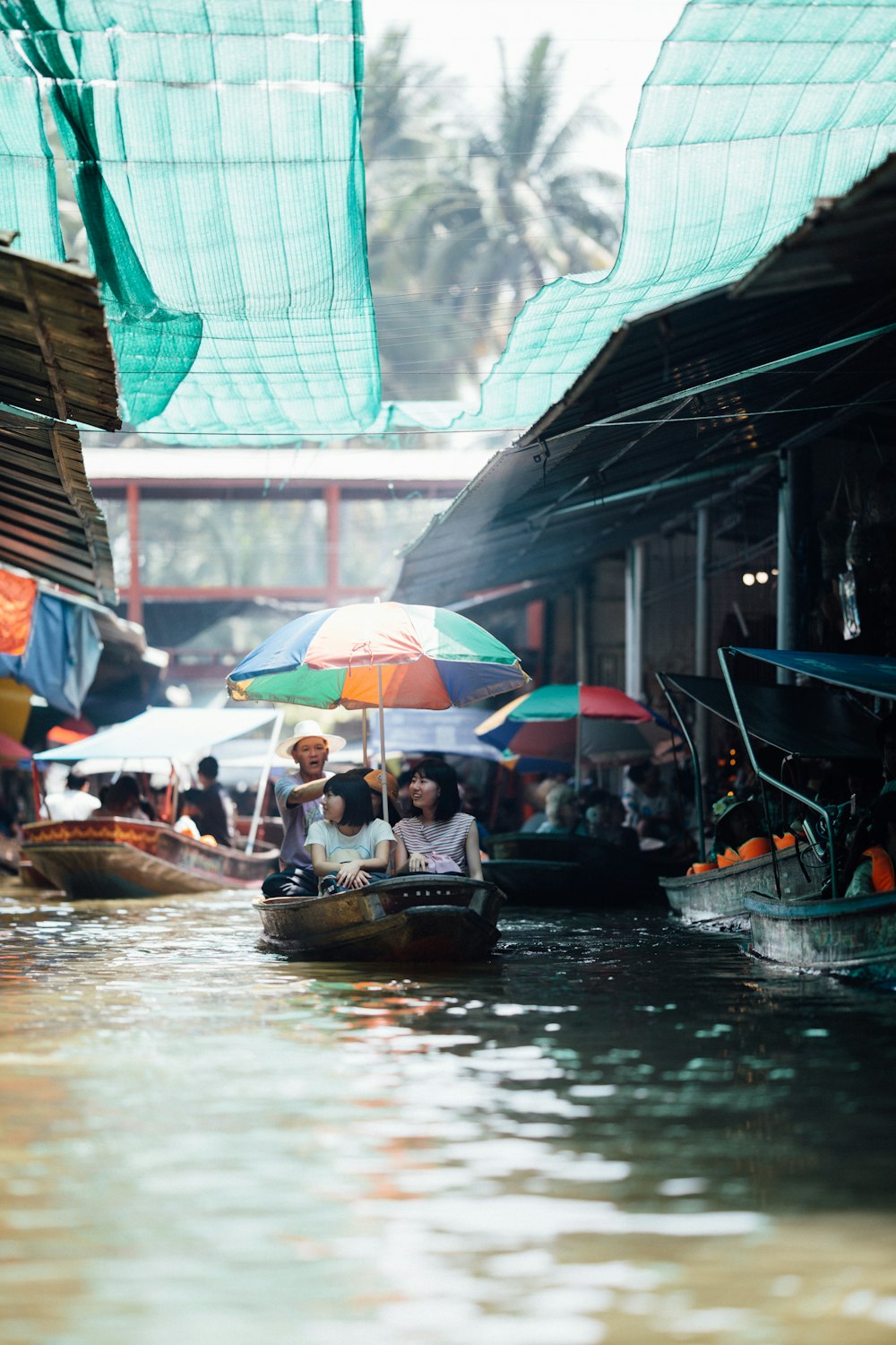 women sitting on boat during daytime