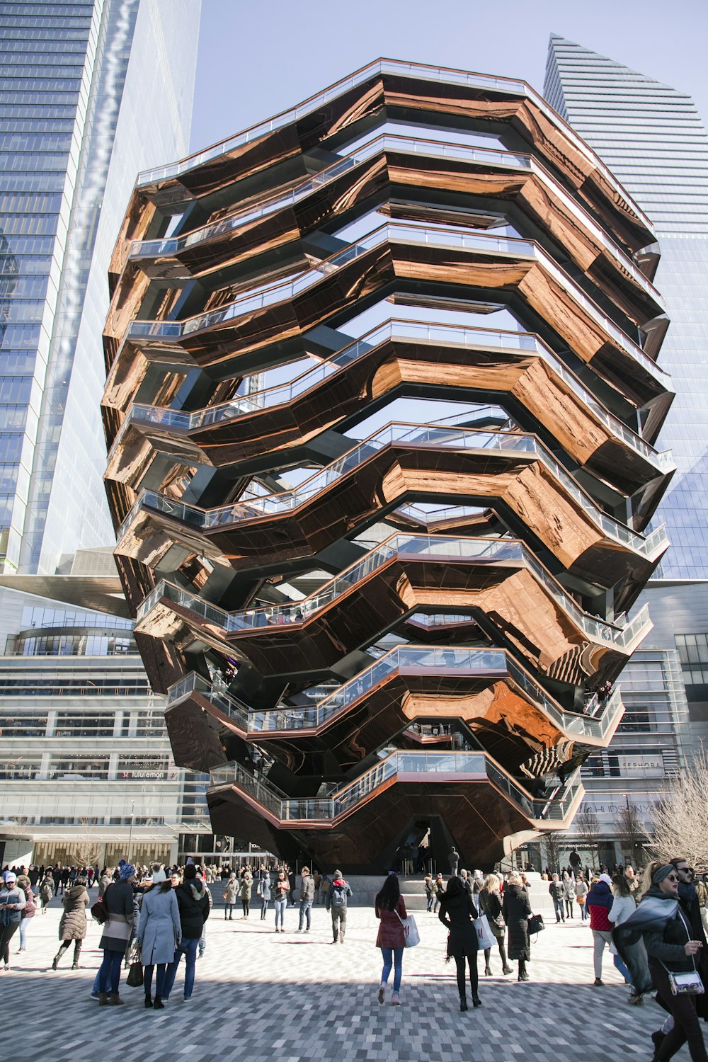 group of people standing beside buildings