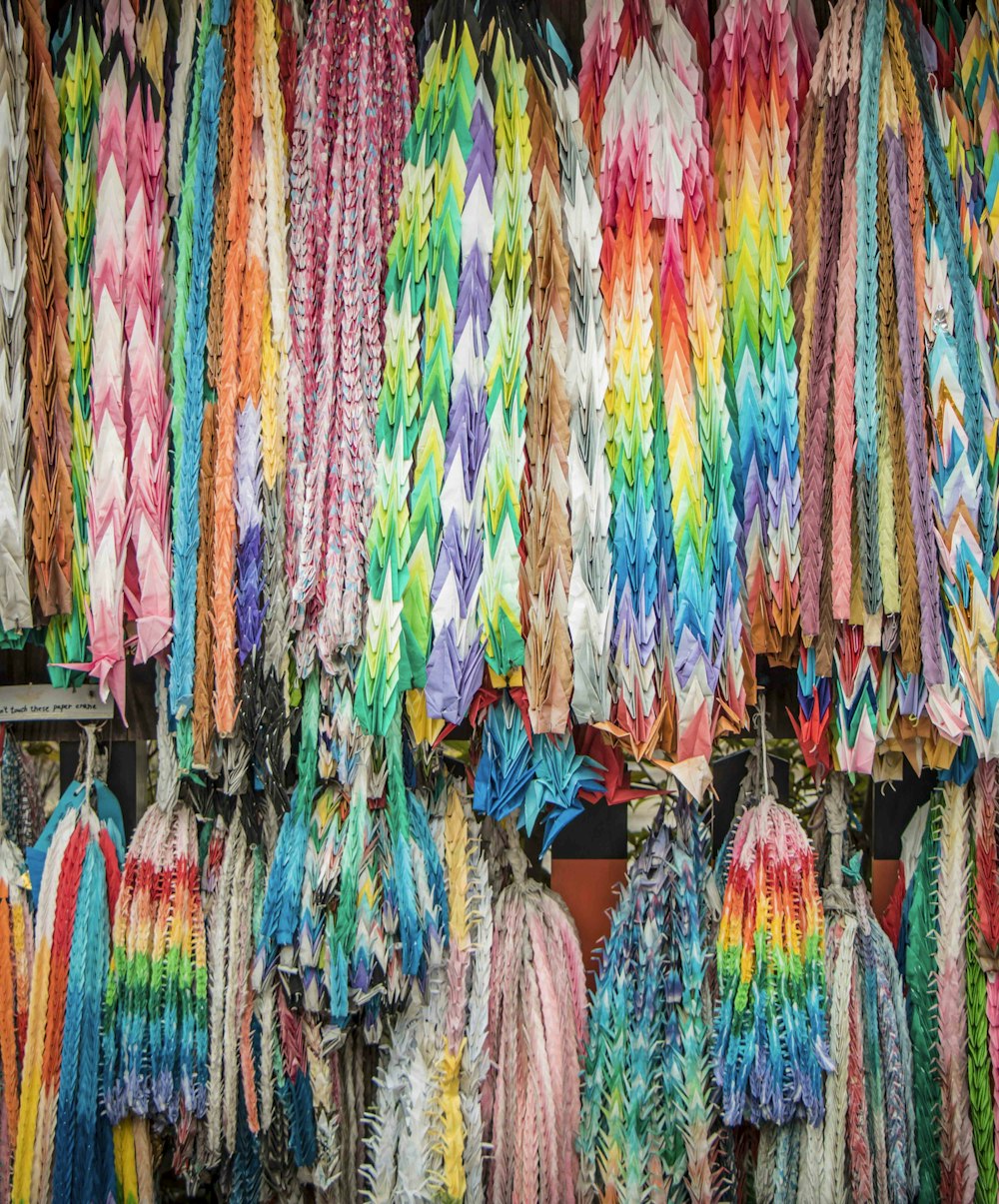 multicolored fabrics hanging on walls