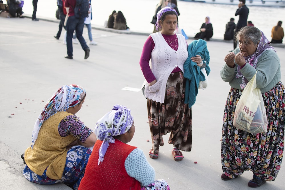 four women talking to each other