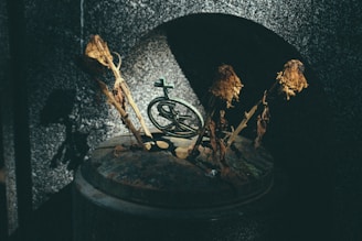 four brown stick on black metal container
