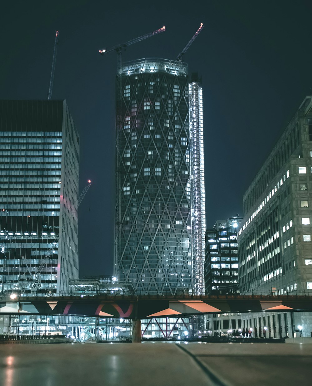 low angle photo of curtain glass wall building