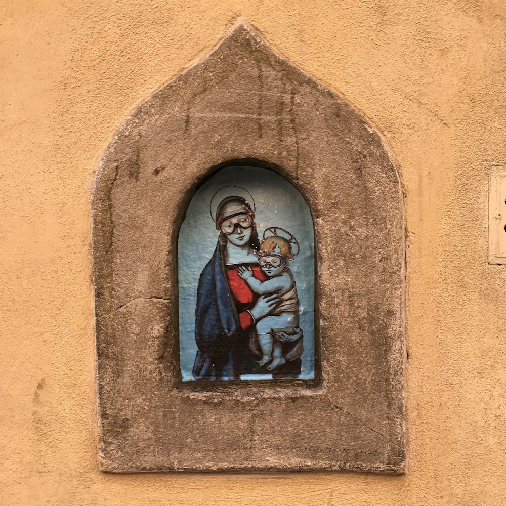 Virgen María y Jesucristo pintando