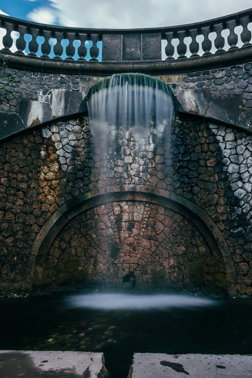 time lapse photography of waterfall