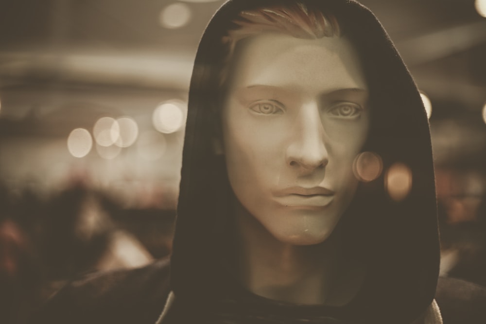 mannequin wearing black hoodie