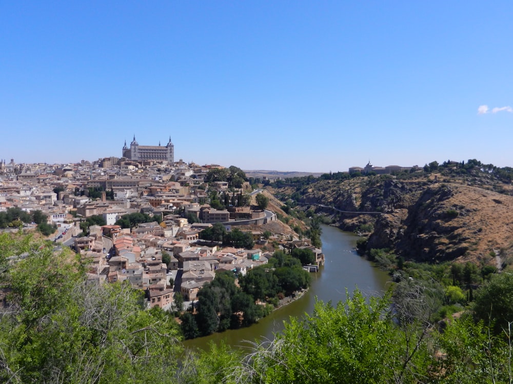 buildings near terrain during daytime