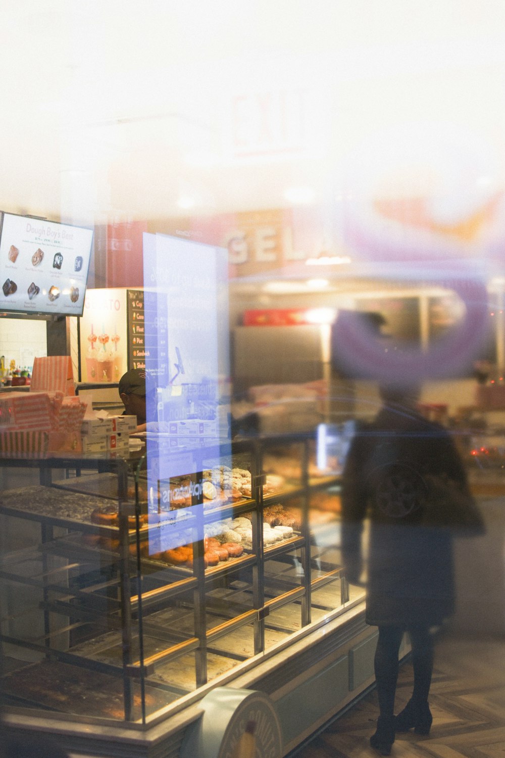 person standing in front of display counter