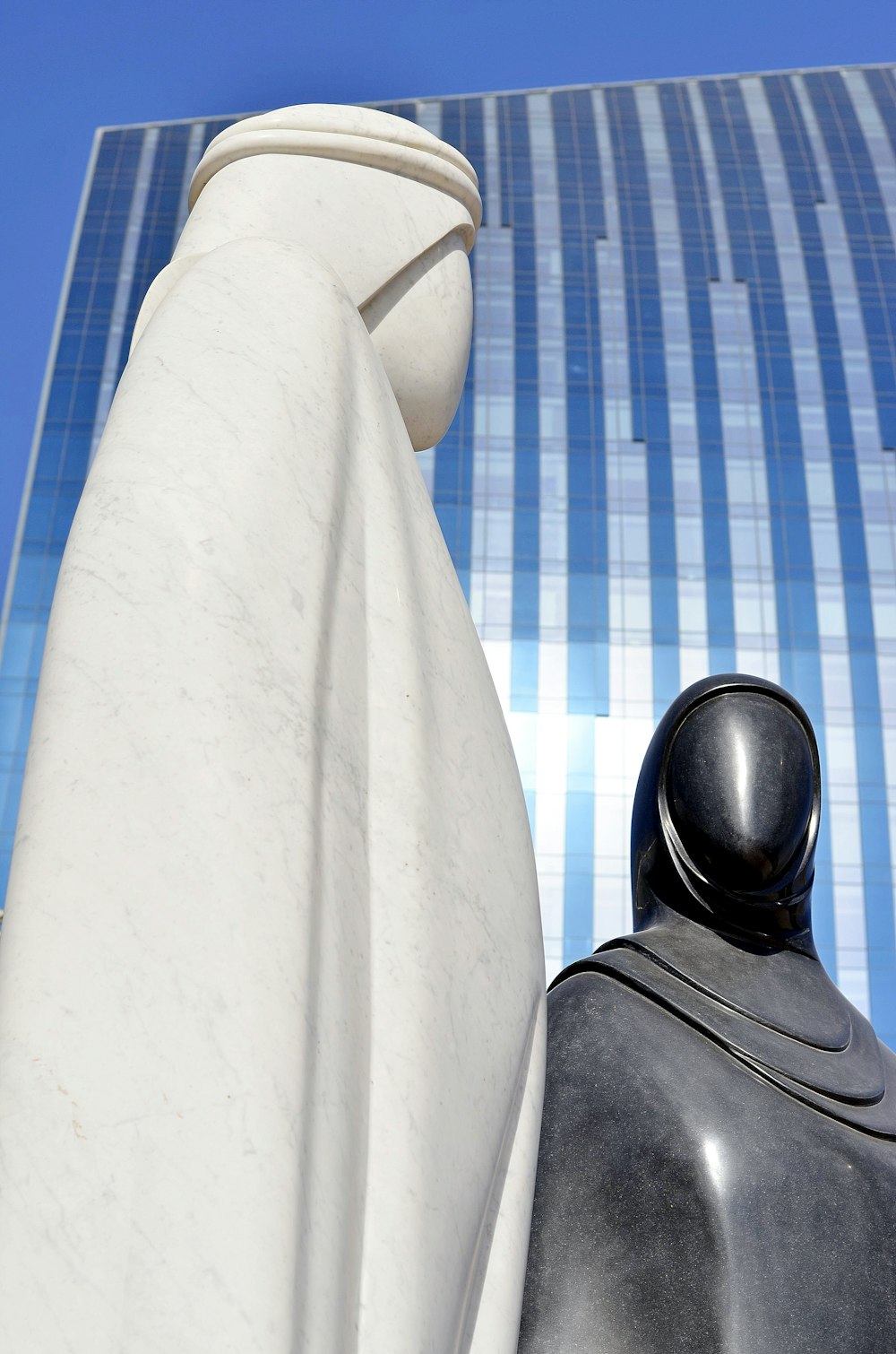 two human statues during daytime close-up photography