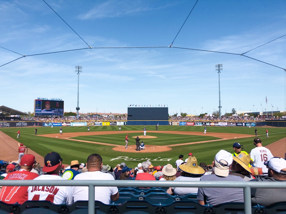 people inside stadium watching baseball game