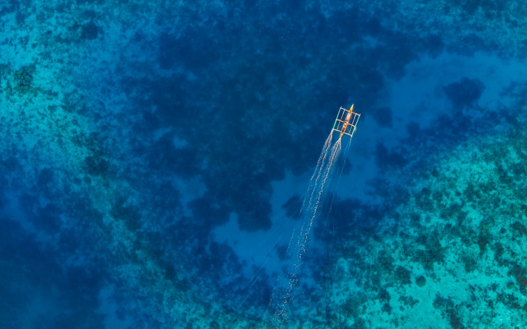 aerial-view photography of boat on sea