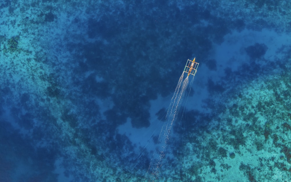 aerial-view photography of boat on sea