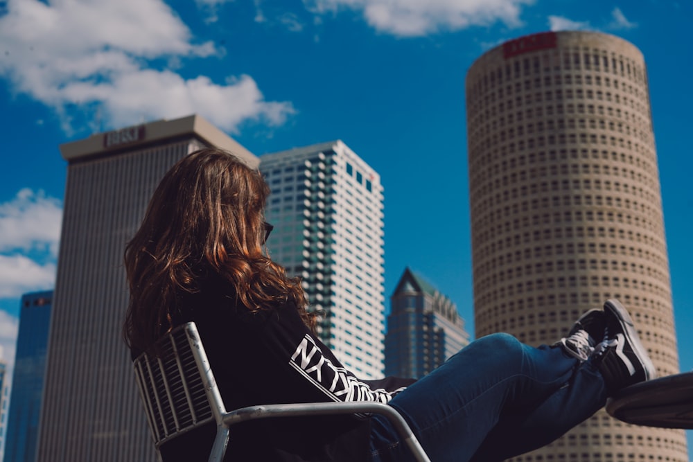 women sitting during daytime