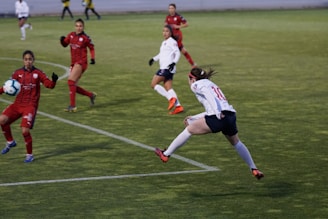 Dynamic shot of a soccer match with Yesenia Hernandez reporting courtside.