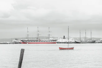 A serene harbor view with ships docked, symbolizing the maritime focus of Aurelia Crew.