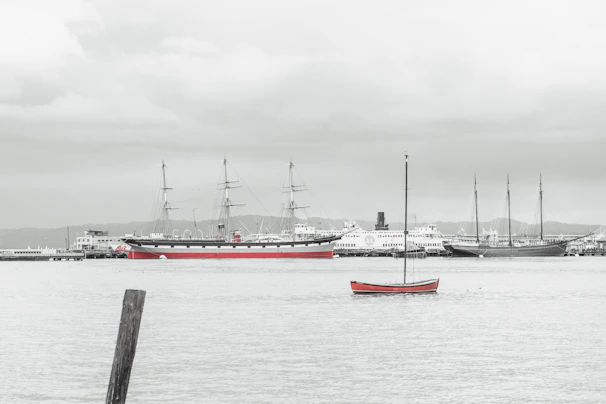 A serene harbor view with ships docked, symbolizing the maritime focus of Aurelia Crew.