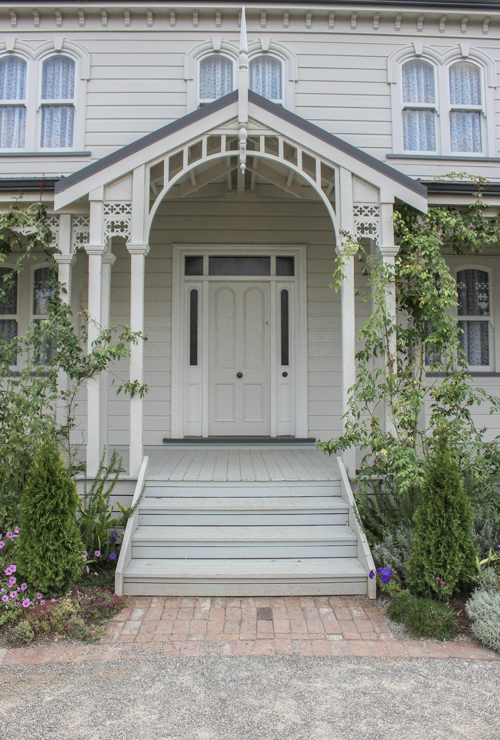 a white house with a white front door