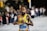 one unknown celebrity in yellow tank top