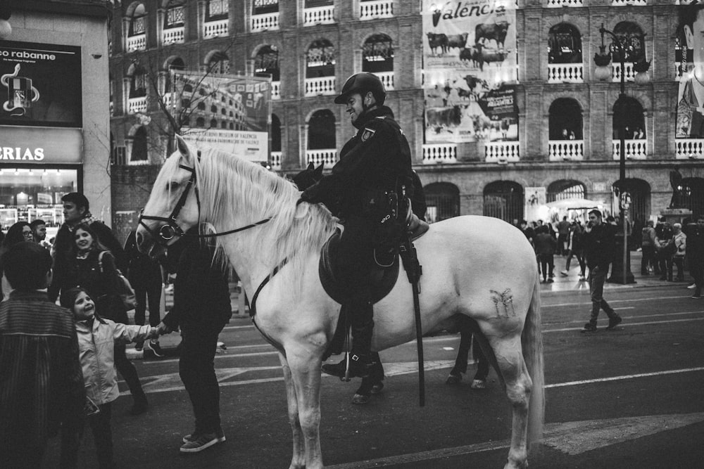 man riding horse