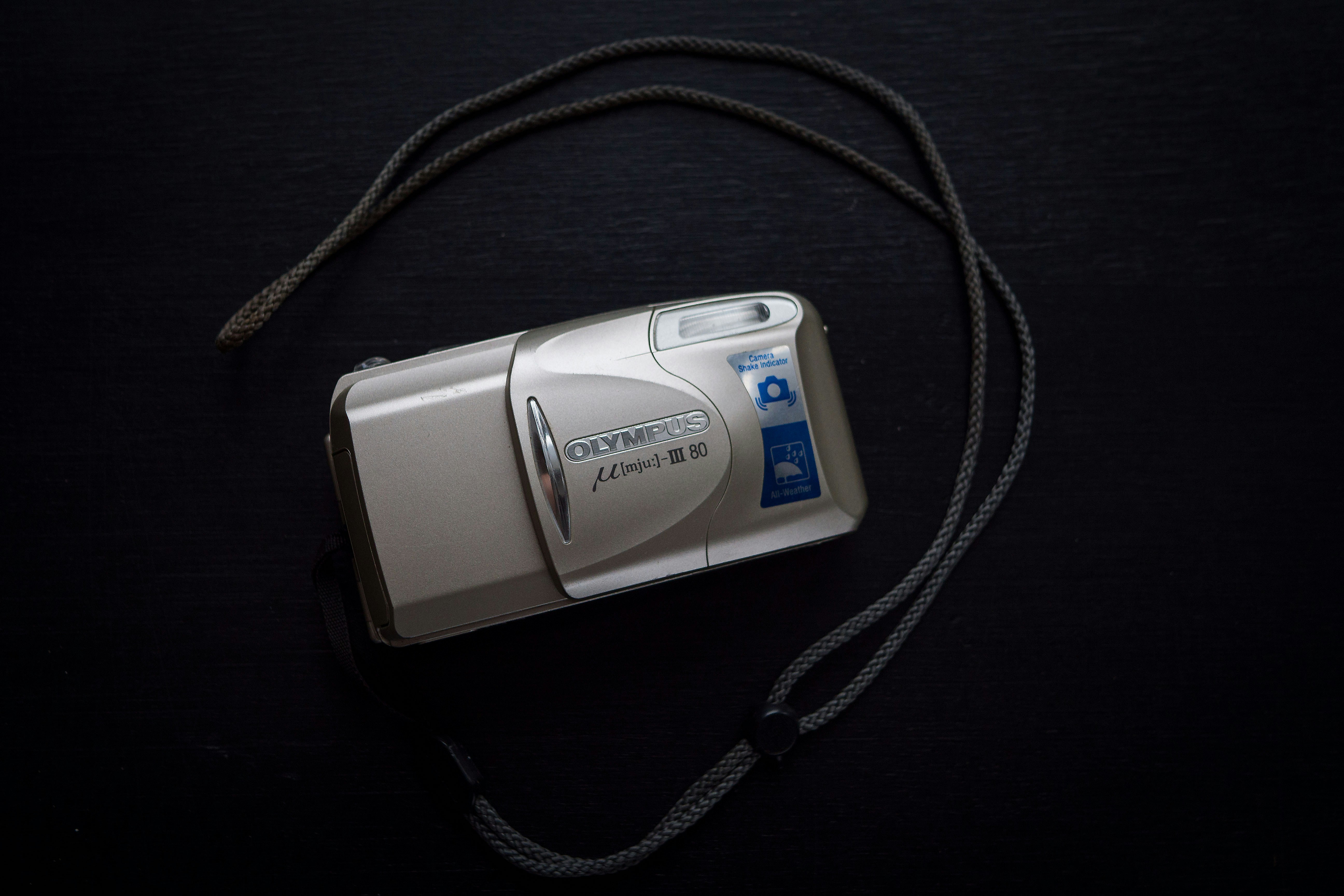 silver Olympus video camera