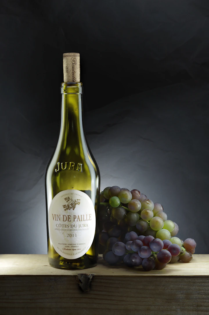 An aged library-release wine bottle with vintage label — ten-year cellaring